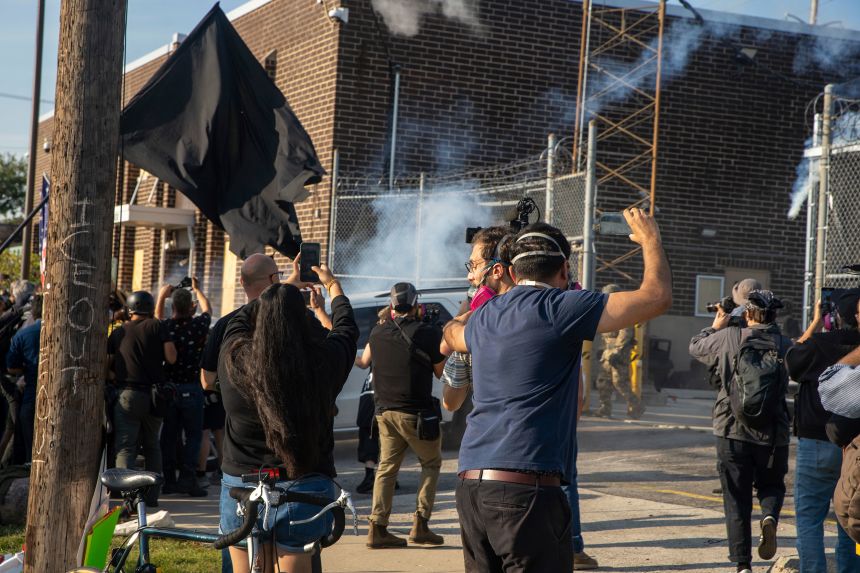Protesters clash with Immigration and Customs Enforcement officers at the ICE facility in Broadview, Illinois, Friday, September 19.