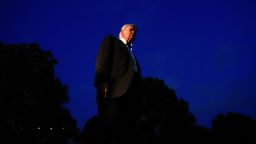 President Donald Trump speaks to reporters before departing the White House on September 20.
