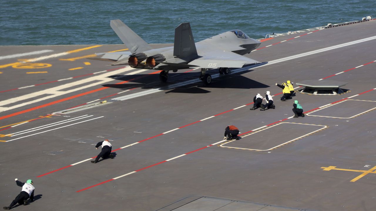 In this undated photo released on September 23, 2025, by Xinhua News Agency, a J-35 stealth fighter jet takeoff from China's third conventionally powered aircraft carrier, the Fujian as they conduct the electromagnetic catapult-assisted takeoff training at an undisclosed location.