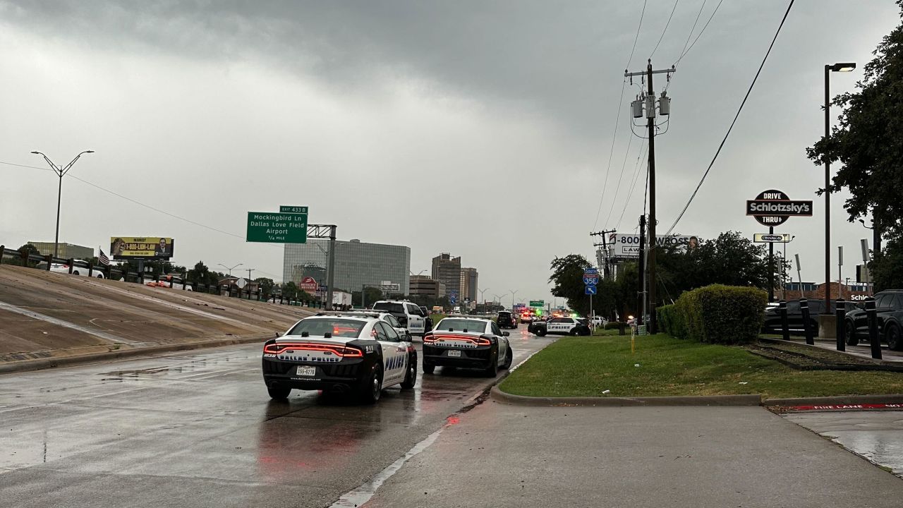 Police block off I-35E close to a U.S. Immigration and Customs Enforcement office after a reported shooting, in Dallas on Wednesday, Sept. 24, 2025. (AP Photo/Jamie Stengle)