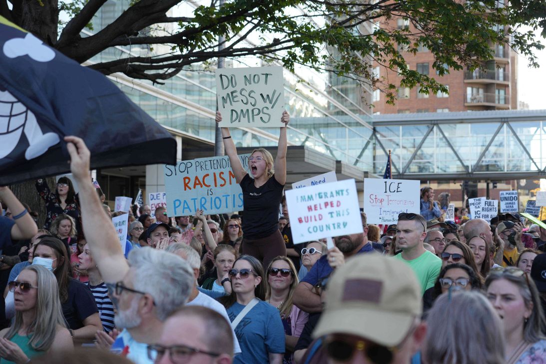 Thousands gather outside the Neal Smith Federal Building in downtown Des Moines, Iowa, on Friday after Des Moines Public School superintendent Ian Roberts is detained by Immigration and Customs Enforcement earlier in the morning.