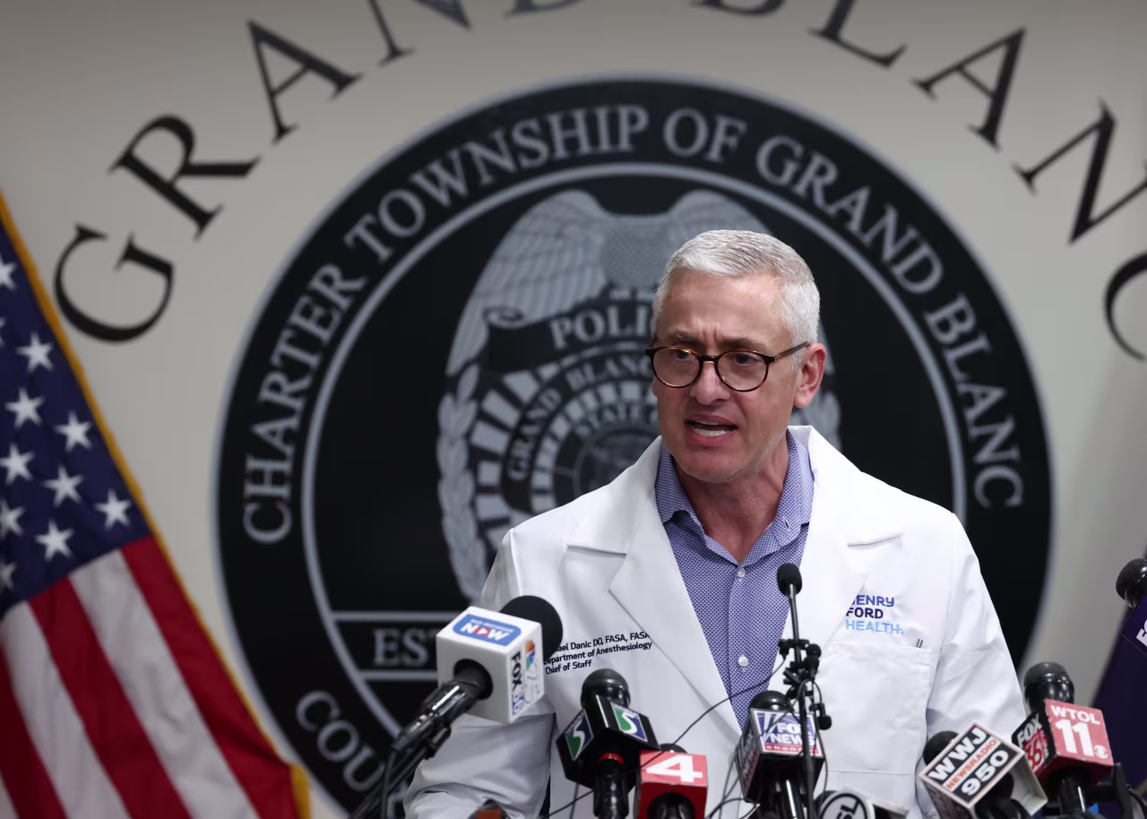 Henry Ford Genesys Hospital Chief of Staff Michael Danic addresses the media during a news conference on Monday.