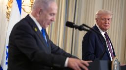 US President Donald Trump listens during a news conference with Israeli Prime Minister Benjamin Netanyahu in the State Dining Room of the White House on September 29.