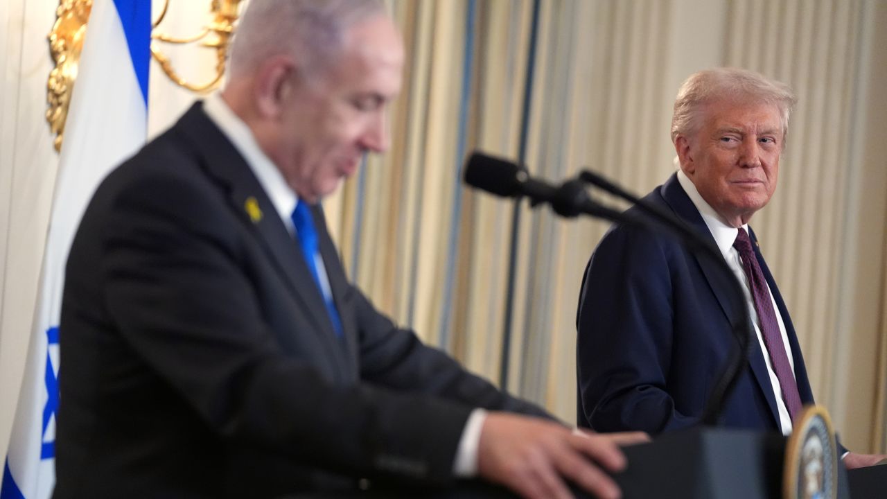 US President Donald Trump listens during a news conference with Israeli Prime Minister Benjamin Netanyahu in the State Dining Room of the White House on September 29.