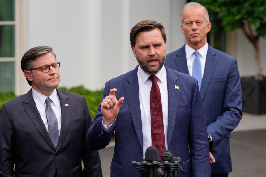 Vice President JD Vance talks to reporters outside the West Wing of the White House, Monday as House Speaker Mike Johnson and Senate Majority Leader John Thune listen.