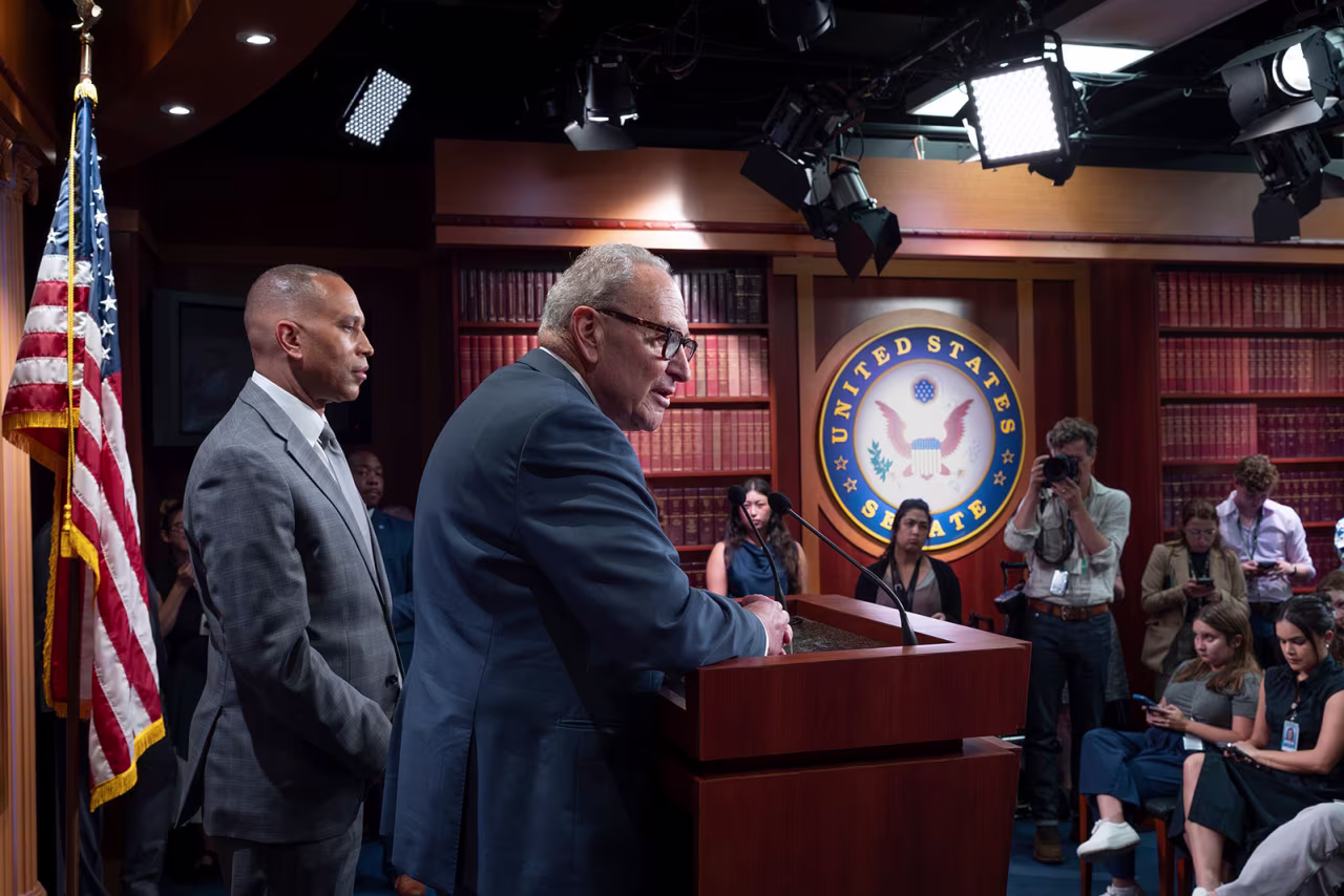 Senate Minority Leader Chuck Schumer and House Minority Leader Hakeem Jeffries, right, talk with reporters following their meeting with President Donald Trump and Republican leaders on the government funding crisis, at the Capitol in Washington, DC, on Monday.