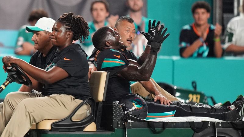Dolphins’ Tyreek Hill carted off field and taken to hospital with serious left leg injury