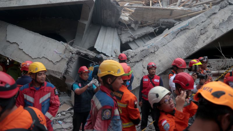 Indonesia school collapse: Frantic rush to reach dozens of students trapped under rubble
