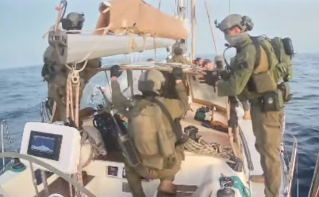 This frame grab from video released by the Global Sumud Flotilla shows Israeli navy soldiers aboard one of the flotilla's vessels after it was intercepted as it approached the coast of Gaza early on Thursday morning.