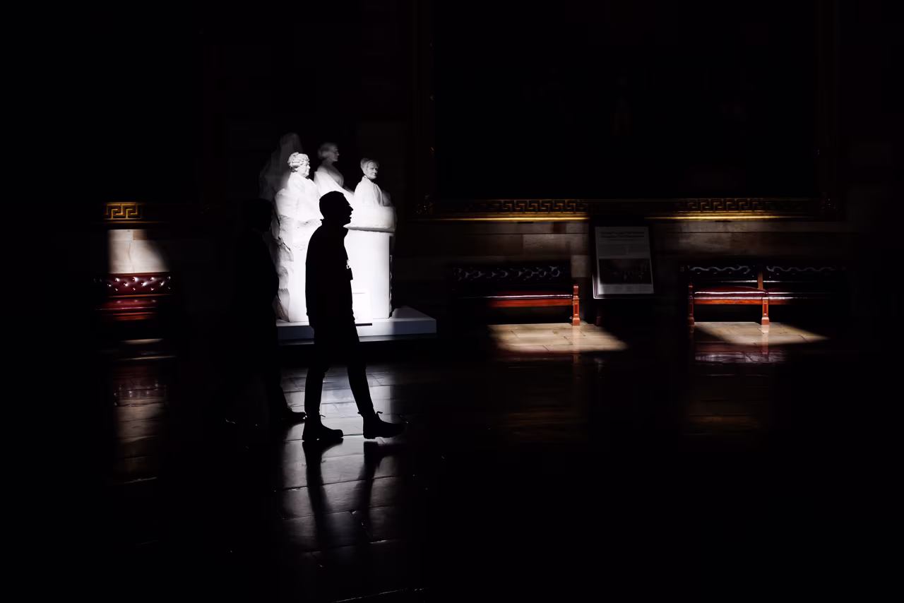 A congressional staffer walks through the US Capitol Rotunda on Thursday.