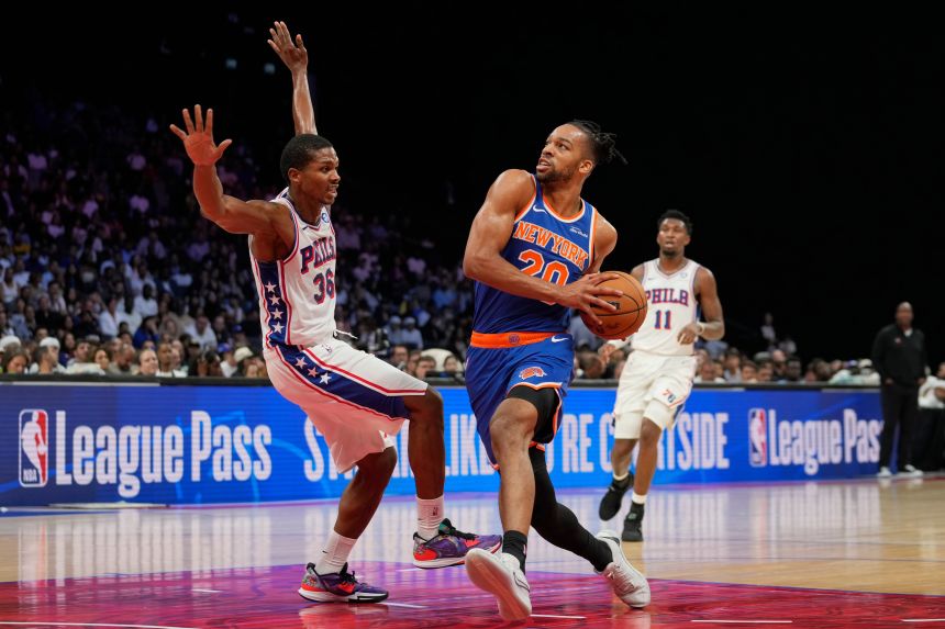 British New York Knicks forward Tosan Evbuomwan drives to the hoop during a preseason game against the Philadelphia 76ers in Abu Dhabi.