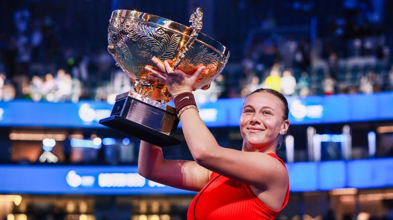 BEIJING, CHINA - OCTOBER 05: Amanda Anisimova of the United States poses with trophy during medal ceremony after winning the Women's Singles Final match against Linda Noskova of Czech Republic on day 14 of the 2025 China Open at the National Tennis Center on October 5, 2025 in Beijing, China. (Photo by China Open Official 2025/VCG via AP )