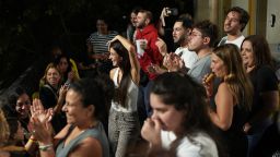 Relatives and supporters of Israeli hostages held by Hamas in the Gaza Strip celebrate after the announcement that Israel and Hamas have agreed to the first phase of a peace plan, as they gather at a plaza known as the hostages square in Tel Aviv, Israel, on October 9, 2025.
