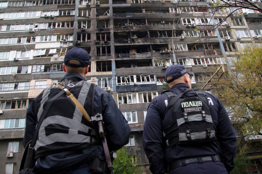 The aftermath of a Russian strike is seen on an apartment block in Kyiv's Pecherskyi district on Friday.