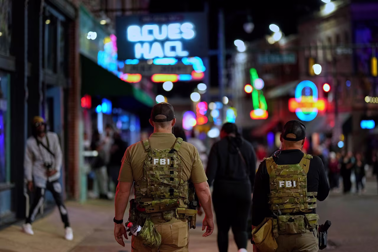 Federal law enforcement agents are are seen on Beale Street, on Friday, October 10, in Memphis, Tennessee.