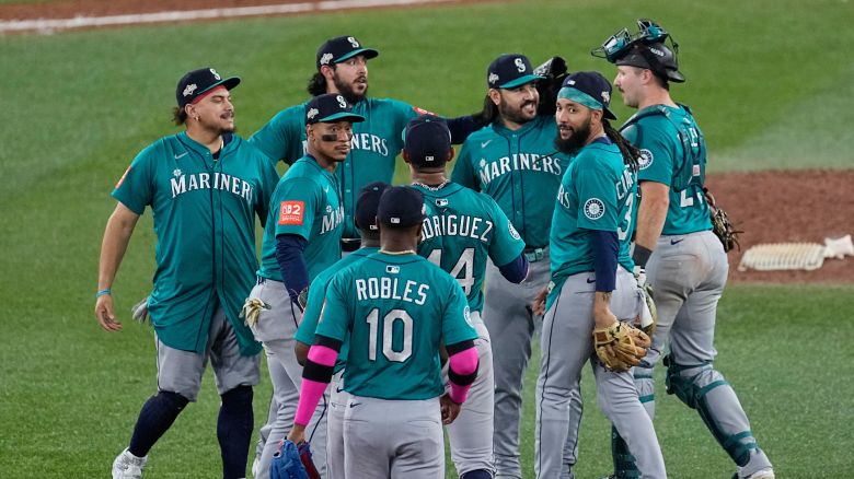 The Seattle Mariners celebrate after Game 1 of baseball's American League Championship Series against the Toronto Blue Jays in Toronto on October 12, 2025.