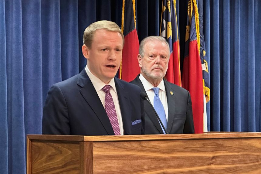 North Carolina state House Speaker Destin Hall, left, and Senate leader Phil Berger hold a news conference in Raleigh on September 11.