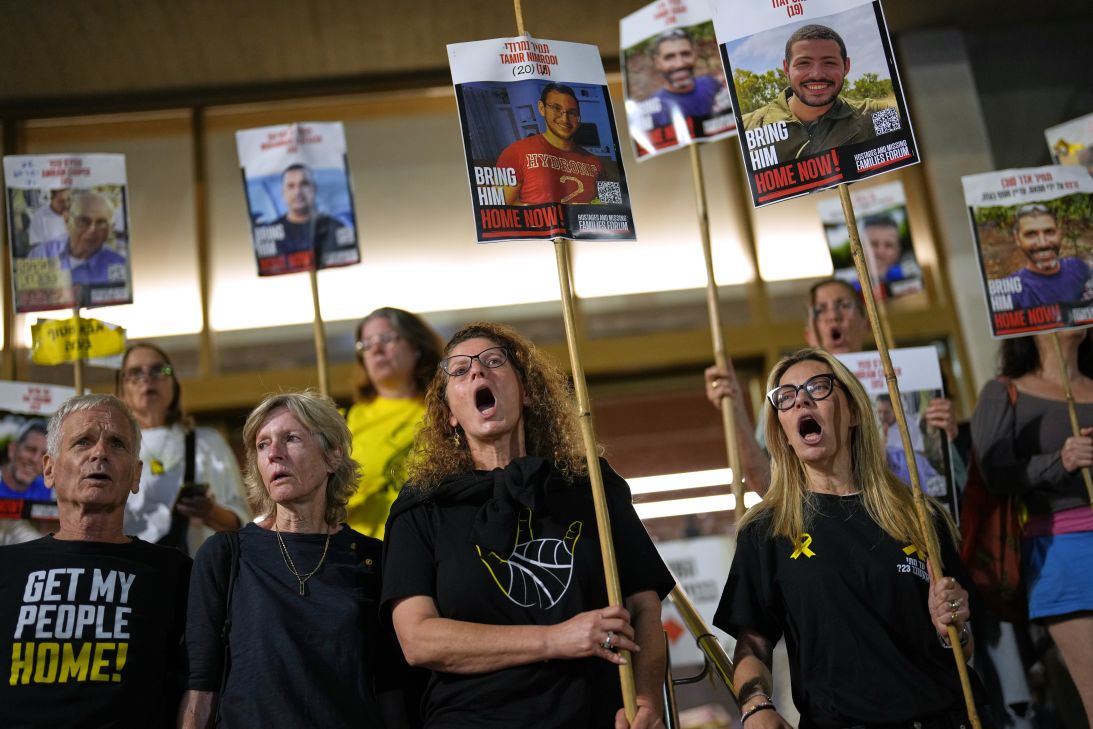 Relatives of hostages whose bodies are still in Gaza Strip call for their release at Hostages Square, in Tel Aviv, Israel, on Tuesday.