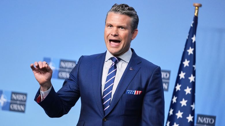 United States Defense Secretary Pete Hegseth speaks as he arrives for a meeting of NATO defense ministers at NATO headquarters in Brussels, Wednesday, Oct. 15, 2025 (AP Photo/Virginia Mayo)