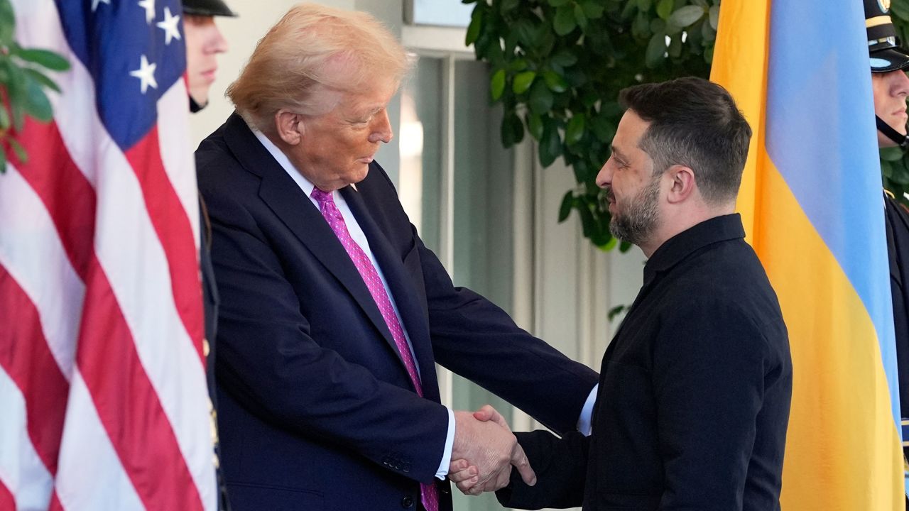 President Donald Trump, left, greets Ukraine's President Volodymyr Zelenskyy at the White House, on Friday, October 17, 2025.