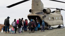 In this photo provided by the Alaska Army National Guard, displaced people are evacuated from Kwigillingok, Alaska, on October 16, 2025, following Typhoon Halong that struck Alaska's west coast.