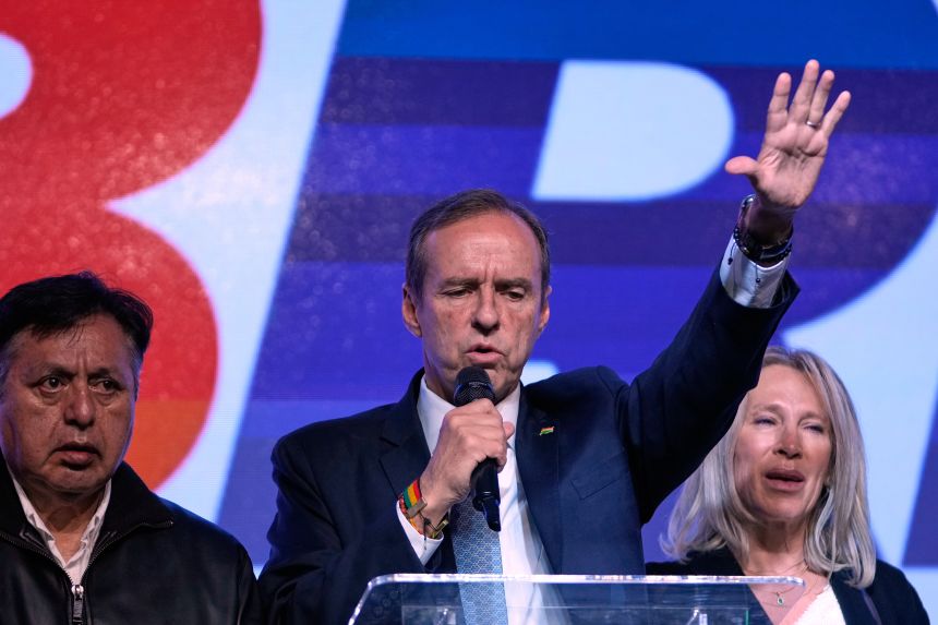 Presidential candidate Jorge "Tuto" Quiroga speaks after early results showed him trailing in the presidential runoff election in La Paz, Bolivia on Sunday.