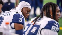 Dallas Cowboys wide receivers George Pickens, left, and Ceedee Lamb sit on the bench during a football game against the Washington Commanders on October 19, in Arlington, Texas.