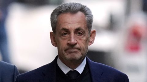 Former French President Nicolas Sarkozy leaves his home Tuesday, Oct. 21, 2025 in Paris as he heads to prison to serve time for a criminal conspiracy to finance his 2007 election campaign with funds from Libya. (AP Photo/Thibault Camus)