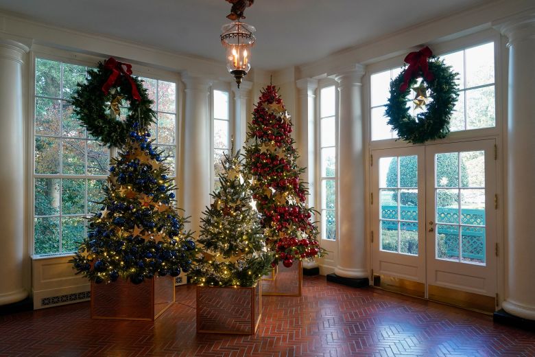 The East Wing of the White House is decorated with trees dedicated to Gold Star families, during a press preview of holiday decorations in November 2022.