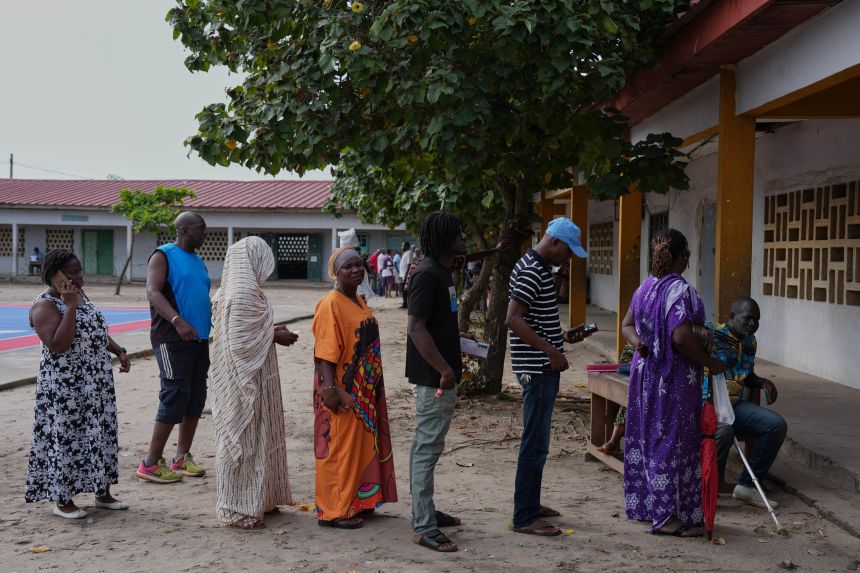 Voters line up at a polling station in Koumassi.