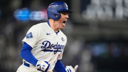 Los Angeles Dodgers' Freddie Freeman celebrates his walk off home run against the Toronto Blue Jays during the 18th inning in Game 3 of baseball's World Series, in Los Angeles, on Monday, October 27, 2025.