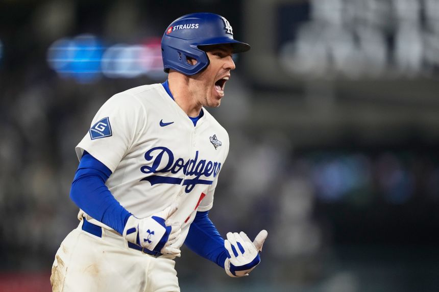 Los Angeles Dodgers' Freddie Freeman celebrates his walk-off home run in Game 3 of the World Series.