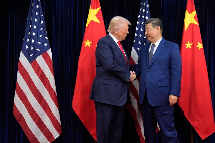 President Donald Trump and Chinese President Xi Jinping shake hands before their meeting.