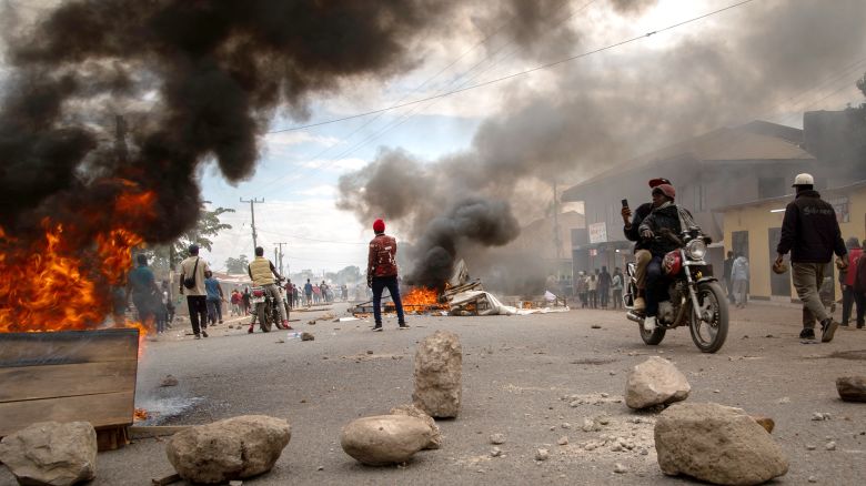 People protest in the streets of Arusha, Tanzania, on election day, Wednesday, October 29.
