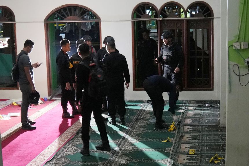 Members of the Indonesian police bomb squad inspect a mosque where an explosion occurred on the grounds of a high school in Jakarta, Indonesia, on Friday, November 7, 2025.