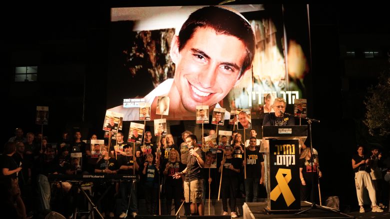 An image of Hadar Goldin, an Israeli soldier killed in 2014 whose body has been held in Gaza since then, is shown during a rally in Tel Aviv, Israel, Saturday, Nov. 8, 2025.