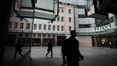 Pedestrians walk outside BBC Broadcasting House in London, Tuesday, Nov. 11, 2025.