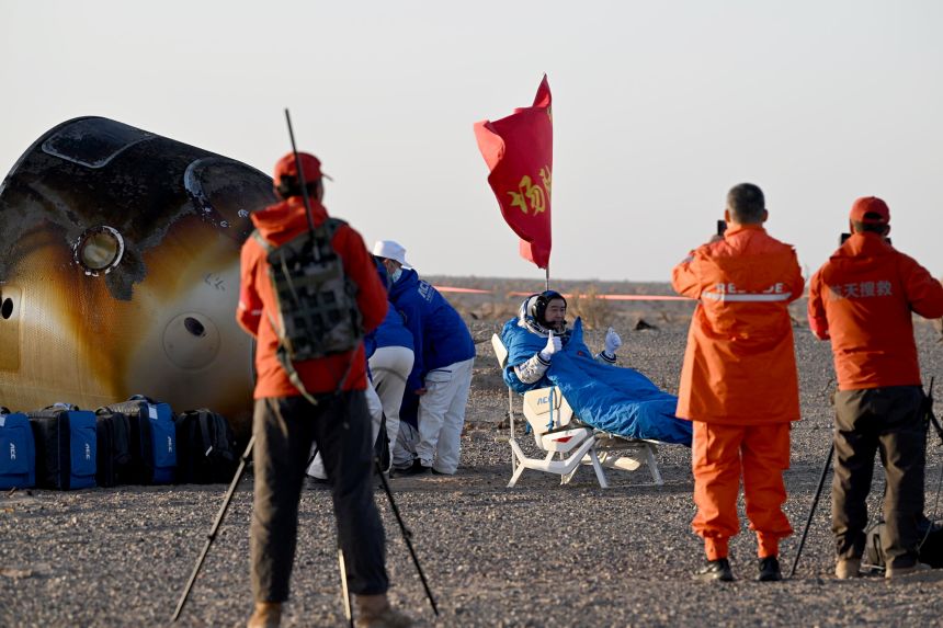 Astronaut Chen Dong, commander of the three-member Shenzhou-20 crew, is out of the Shenzhou-21 spaceship's return capsule after it touched down on Friday.