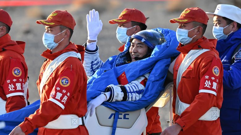 In this photo released by Xinhua News Agency, Chen Zhongrui, a Shenzhou-20 astronaut, is carried out from the Shenzhou-21 spaceship's return capsule after it touched down on Earth at the Dongfeng landing site in northern China's Inner Mongolia Autonomous region on Friday, Nov. 14, 2025. (Li Zhipeng/Xinhua via AP)