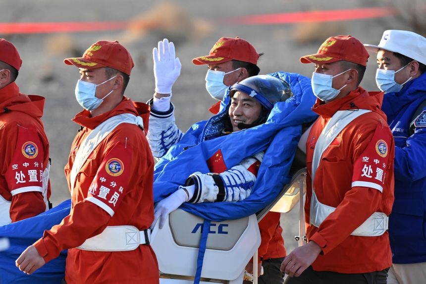 Chen Zhongrui, a Shenzhou-20 astronaut, is carried out from the Shenzhou-21 spaceship's return capsule after it touched down on Earth at the Dongfeng landing site in northern China's Inner Mongolia Autonomous region on Friday, November 14.