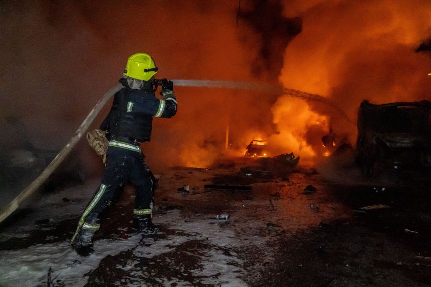 Rescue workers put out a fire at a residential building damaged by a Russian strike in Kharkiv, Ukraine, Wednesday, November 19, 2025.