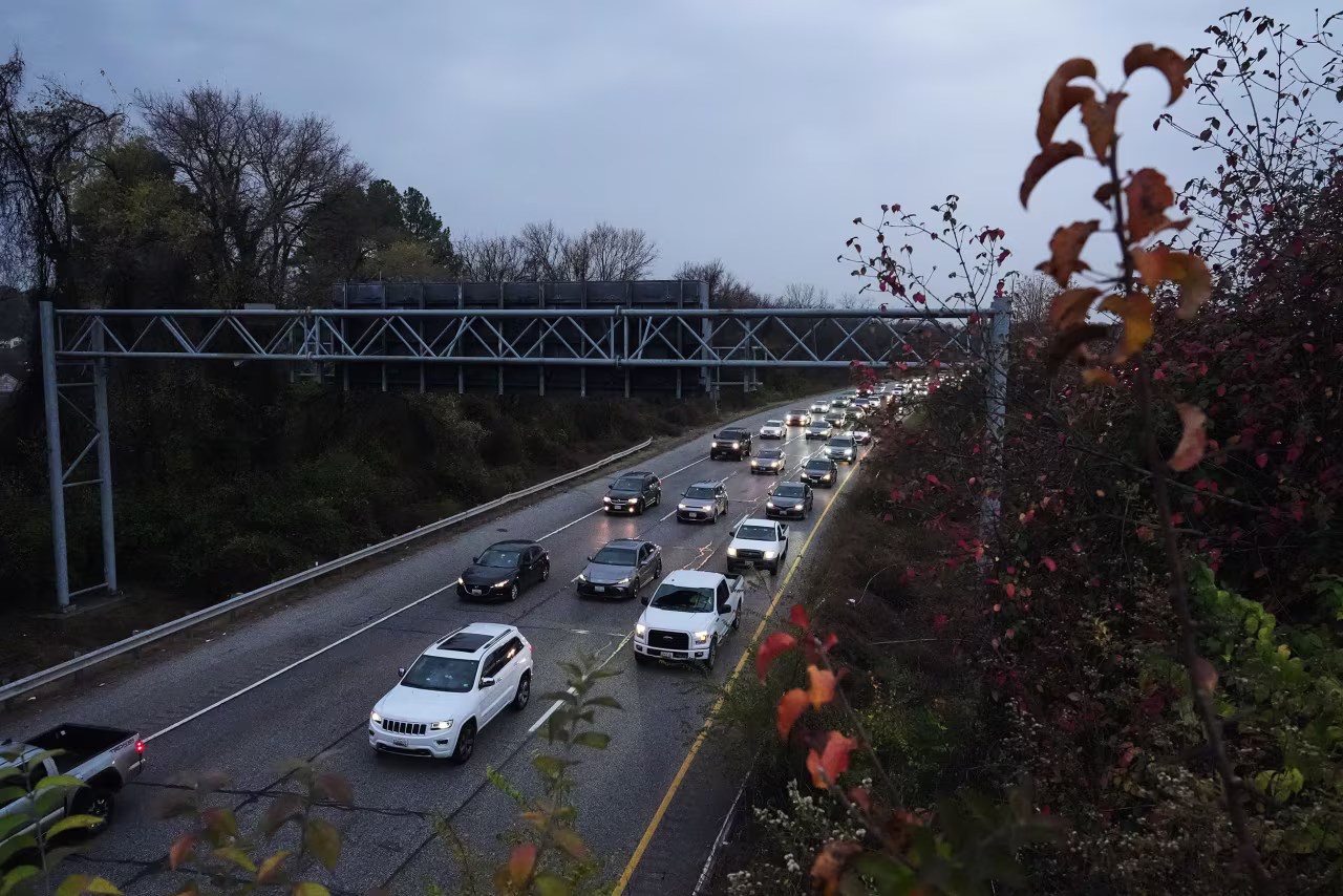 Cars drive on the Baltimore/Washington Parkway in Linthicum Heights, Maryland, November 25.