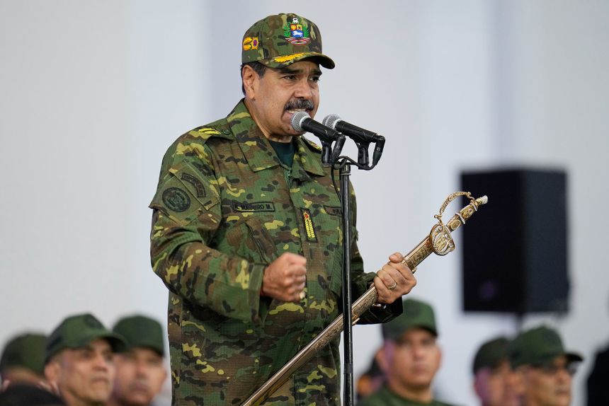 Venezuelan President Nicolas Maduro speaks during a government-organized civic-military rally in Caracas, Venezuela, Tuesday, November 25.