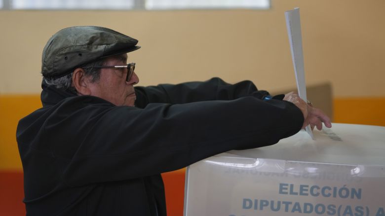 A voter casts his ballot during general elections in Tegucigalpa, Honduras, on Sunday.