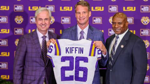 December 1, 2025: New LSU Head Football Coach Lane Kiffin, Athletics Director Verge Ausberry, and LSU President Wade Rousse pose for a picture after his first press conference at Tiger Stadium's South Stadium Club in Baton Rouge, LA. Jonathan Mailhes/CSM (Credit Image: © Jonathan Mailhes/Cal Sport Media) (Cal Sport Media via AP Images)