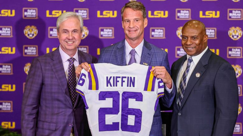 December 1, 2025: New LSU Head Football Coach Lane Kiffin, Athletics Director Verge Ausberry, and LSU President Wade Rousse pose for a picture after his first press conference at Tiger Stadium's South Stadium Club in Baton Rouge, LA. Jonathan Mailhes/CSM (Credit Image: © Jonathan Mailhes/Cal Sport Media) (Cal Sport Media via AP Images)