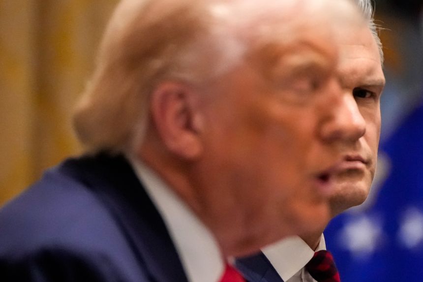 Defense Secretary Pete Hegseth watches as President Donald Trump speaks during a Cabinet meeting at the White House in Washington DC, on, December 2, 2025.