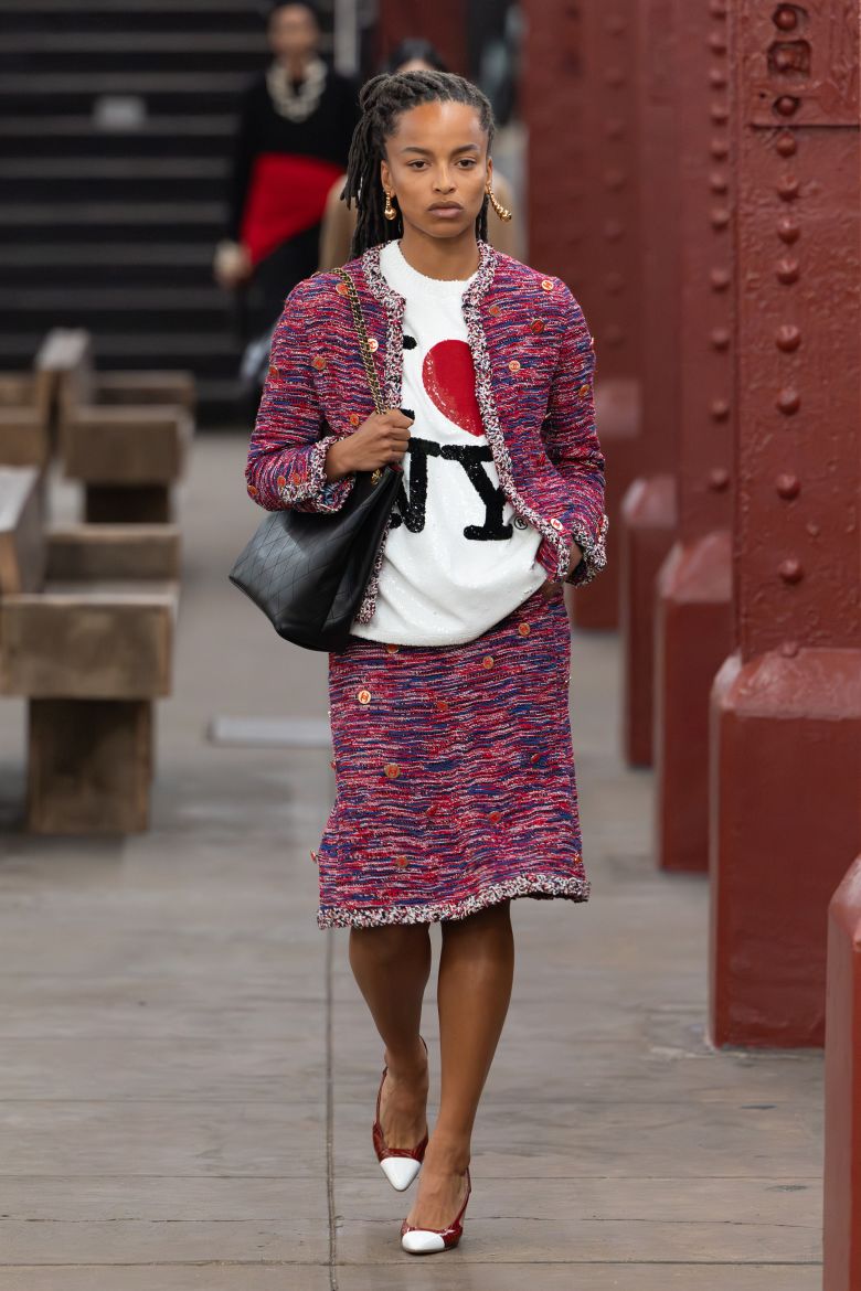A play on Chanel's signature tweed suits, worn over a T-shirt.