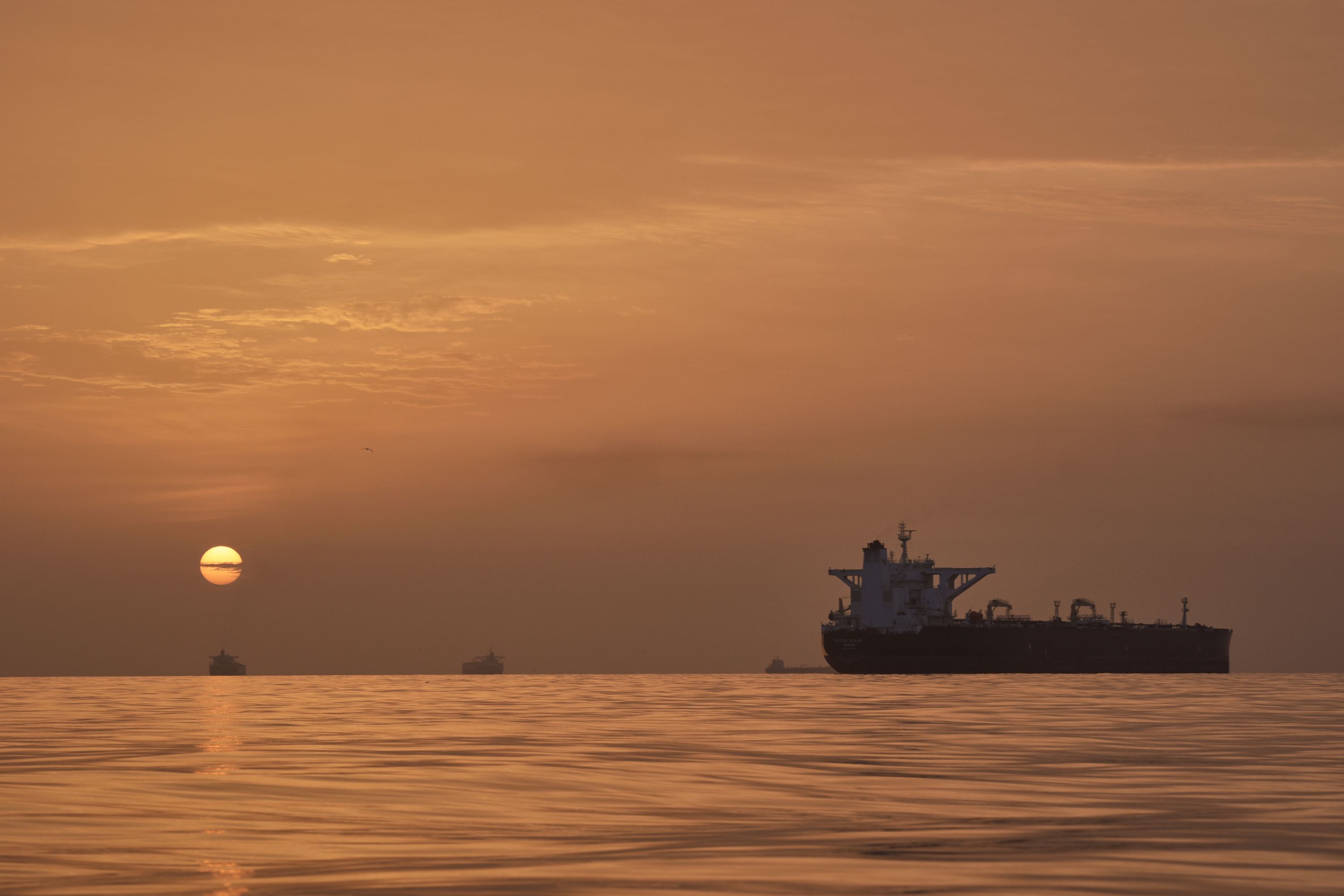 Tankers are anchored in the Strait of Hormuz off the coast of Qeshm Island, Iran, on April 18.