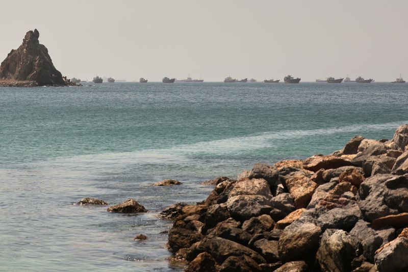 Qatari oil tanker struck near Strait of Hormuz after ignoring warnings; Iran's IRGC reportedly fired at ships as Trump heads to NATO summit